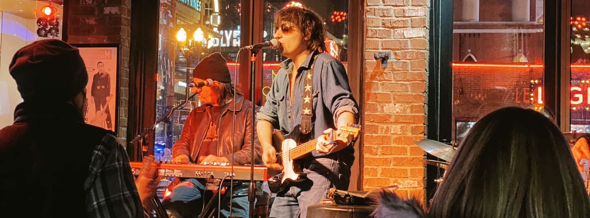 bar singer on guitar in Morgantown
